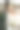 新娘的肖像透过玻璃橱窗与反映剪影的新郎。有创意的婚礼照片。图片下载
