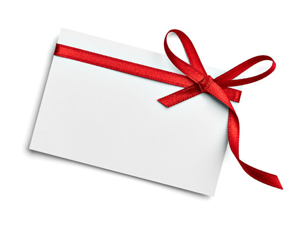 彩带蝴蝶结卡片的圣诞庆祝问候图片下载