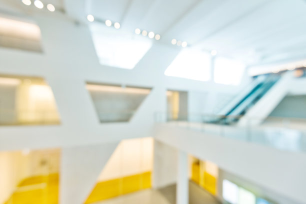 现代购物中心模糊背景散焦图片下载