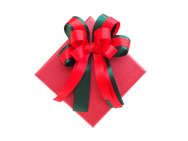 圣诞礼盒与弓在白色的背景。图片下载