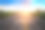 在金色的夕阳下，美丽的蓝天下，空旷的柏油路中间，写着“2020”二字。图片下载