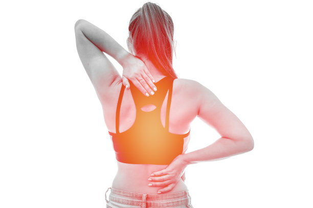 手放在脖子后面的女人。疼痛概念孤立于白色图片下载