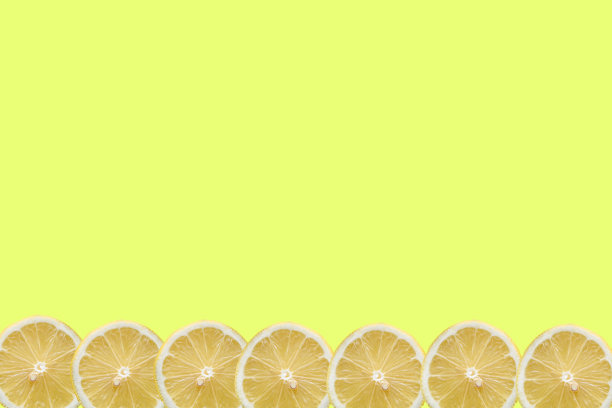 黄色背景上的柠檬水果图案图片下载