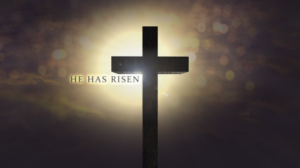 复活节背景与耶稣基督十字架在一个惊人的天空日出和他已经上升的文本。图片下载