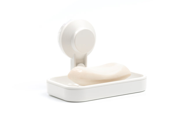 白色背景上的肥皂碟上的肥皂。图片下载