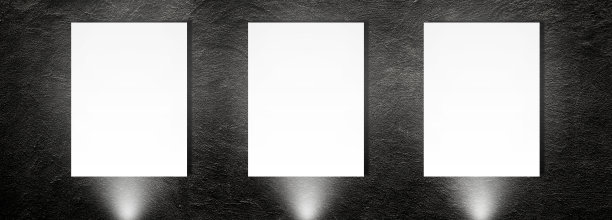 暗室混凝土墙与白板和聚光灯的广告设计。图片下载