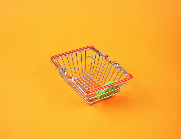 购物车在橙色的背景图片下载