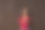 圣诞节孕妇在牛仔裤短裤和红色上衣牵手腹部在一个深棕色的背景。怀孕，母性，期望概念。美丽柔情的怀孕照片图片下载