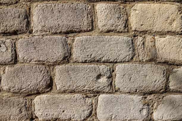 背景是一堵古老建筑的石墙图片下载