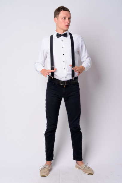 全身拍摄的年轻商人与吊带思考图片下载