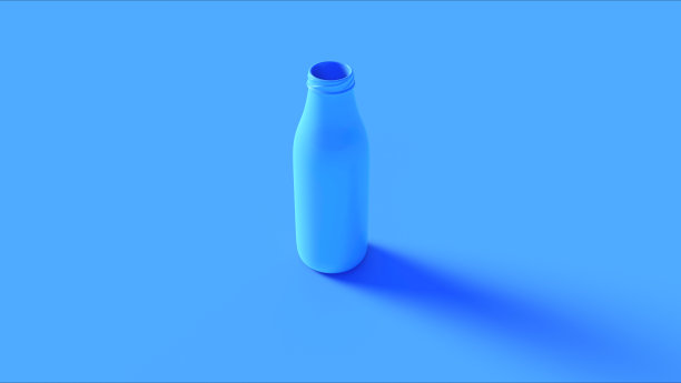 蓝色液体在一个玻璃牛奶瓶图片下载