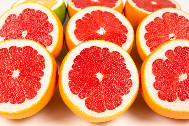柚子和葡萄柚片背景。图片下载