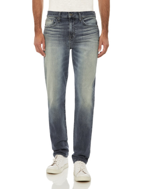 时尚修身灰色牛仔布搭配黑色运动鞋与白色背景图片下载