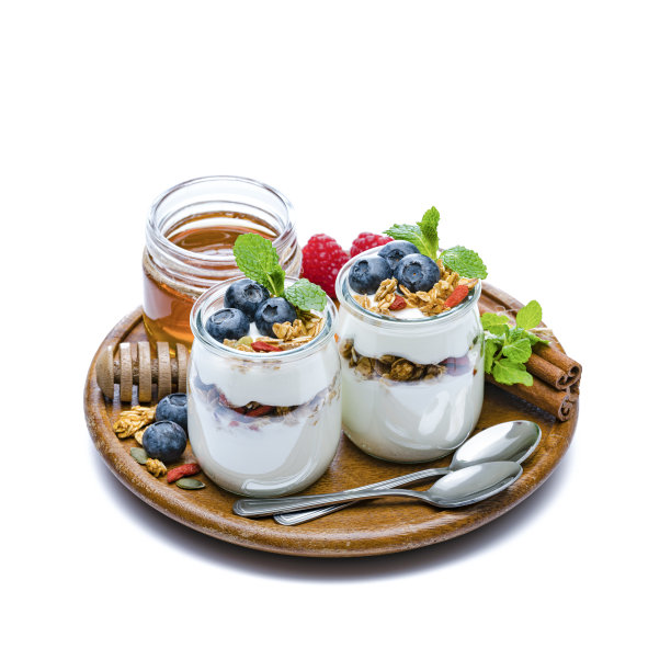 酸奶加格兰诺拉麦片，浆果和蜂蜜的白色背景。图片下载