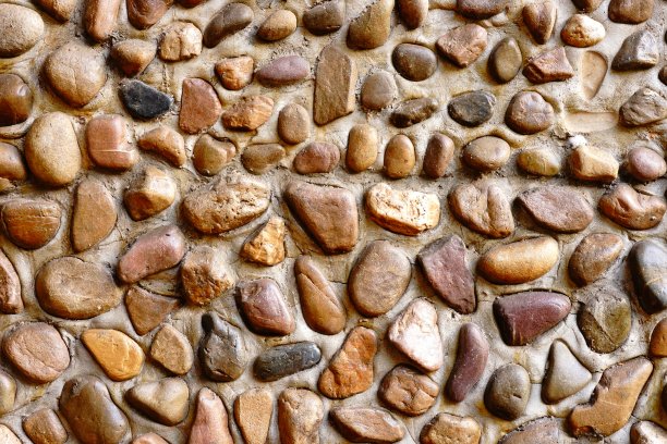 以凹凸不平的石头为背景的墙图片下载