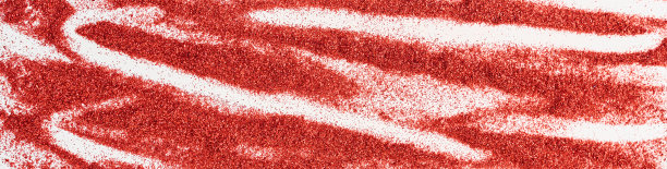 抽象的纹理背景。红色的纹理闪闪发光，长条旗图片下载