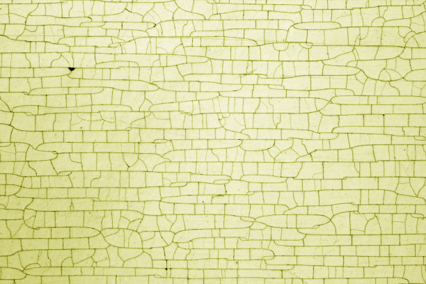 黄色调的金属纹理上有裂纹。图片下载