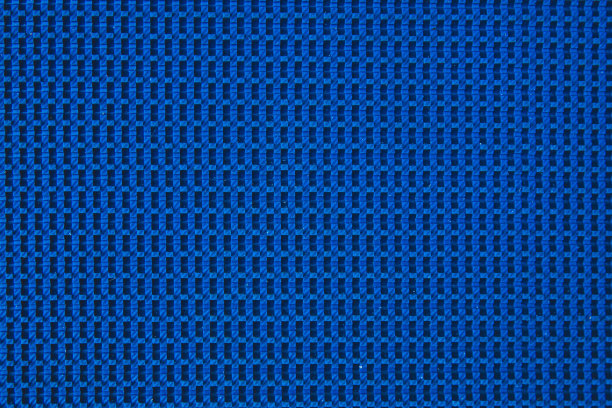 蓝色纹理背景图案表面。蓝色抽象塑料，织物或橡胶纹理无缝图案。图片下载