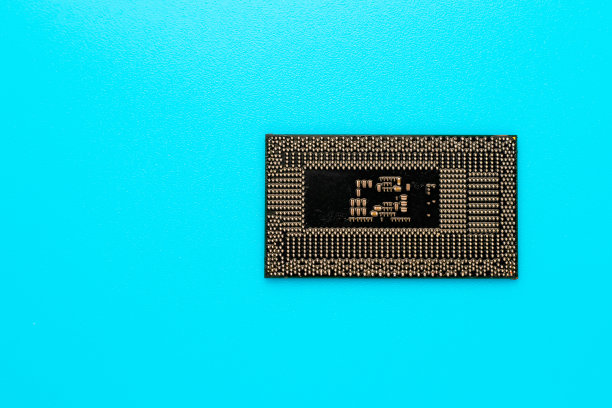 处理器,cpu。微处理器的电脑。微芯片的电脑在一个绿松石背景。技术的概念。图片下载
