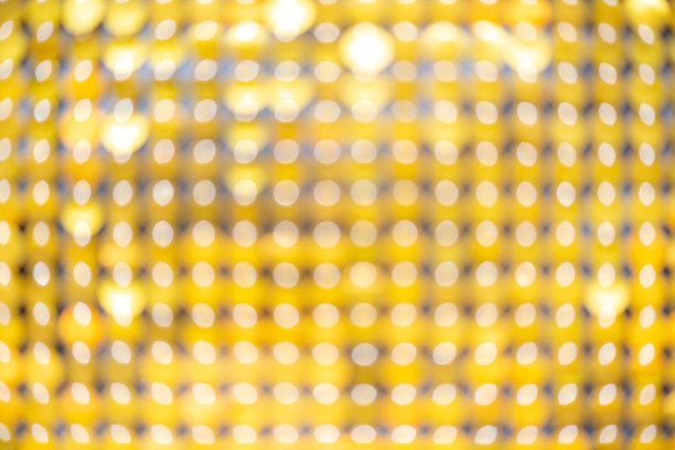 抽象模糊亮片连衣裙色彩斑斓的散景金色灯光。设计背景。迪斯科颜色图片下载