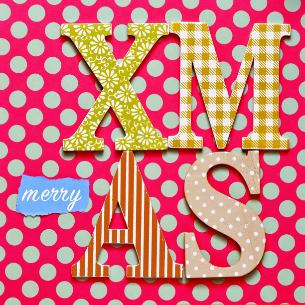 文字圣诞在一个丰富多彩的背景图片下载