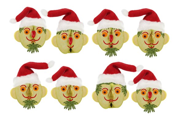 创意的食物概念。很少有有趣的圣诞老人画像来自蔬菜和水果。图片下载