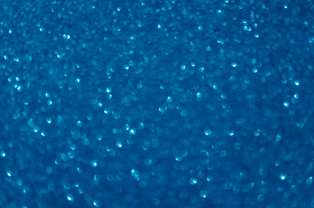 蓝色闪烁的抽象背景。节日的概念。2020年的颜色概念。散焦图片下载