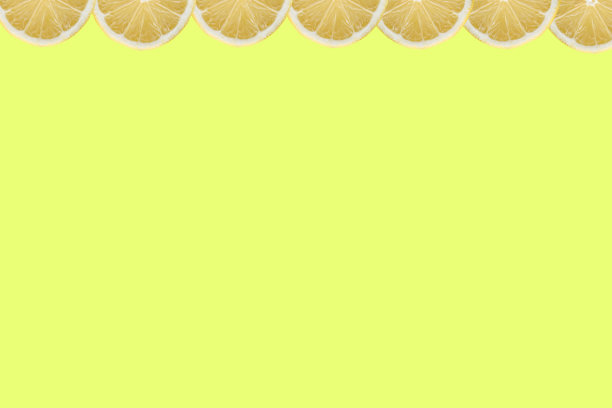 黄色背景上的柠檬水果图案图片下载