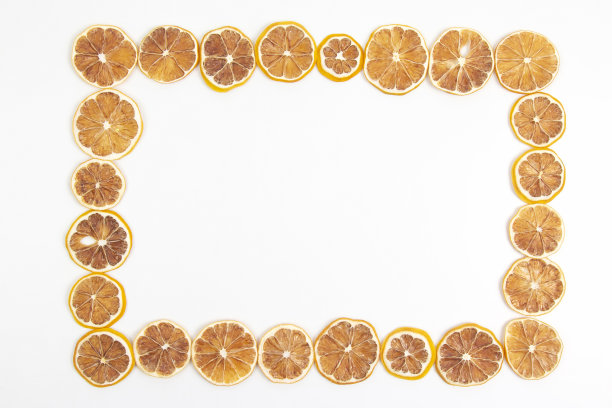 干柠檬片，白色背景。维生素的水果食物图片下载