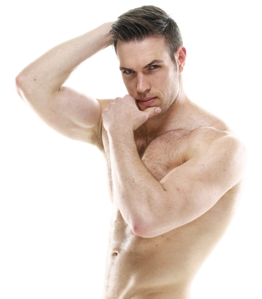 一个男人/一个人/腰部以上的20-29岁的成年英俊的白人男性/年轻男子穿着半裙子谁是一个性感的象征/肌肉的build /赤膊//性感/男子气/腹肌/胸躯干图片下载