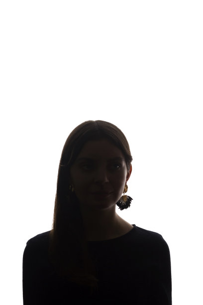 肖像美丽的年轻女孩看在前面的概念-剪影，孤立图片下载