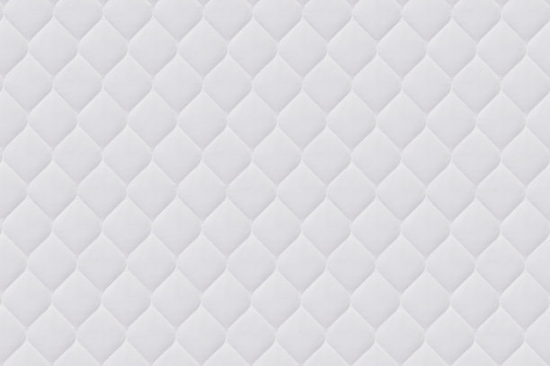 特写的白色床垫床上用品图案背景图片下载