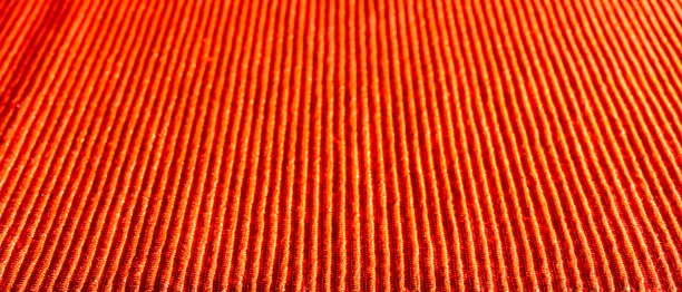 红色面料表面镶金线。图片下载