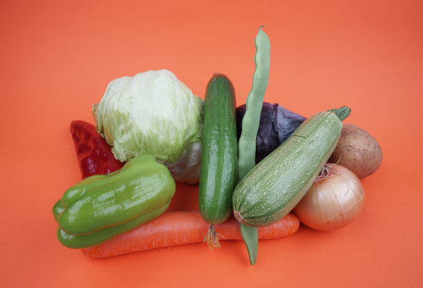 橙色背景的水果和蔬菜图片下载