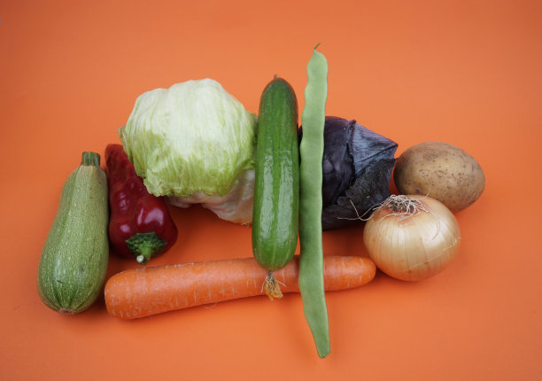 橙色背景的水果和蔬菜图片下载