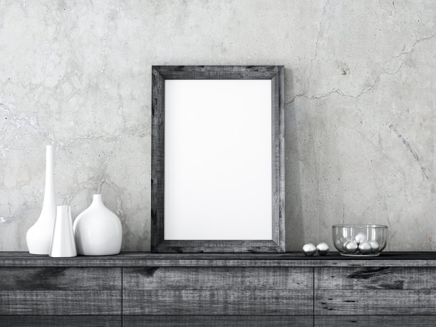 黑色木框海报模型站在客厅的橱柜上图片下载