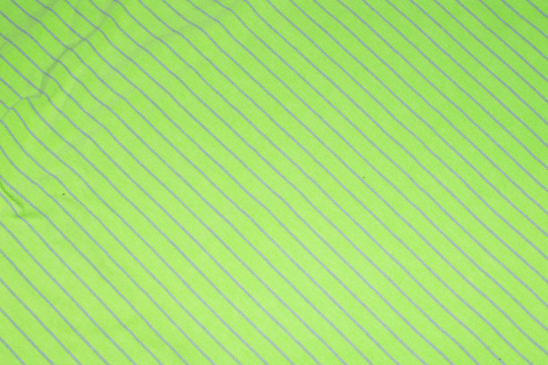 带有灰色条纹的绿色织物。图片下载