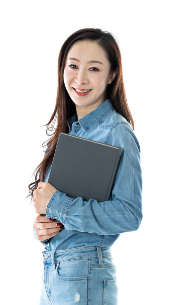 愉快的女性拿着书在白色的背景上图片下载