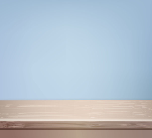 空木桌展示蒙太奇。蓝色墙壁上的米色木制桌面面板。图片下载