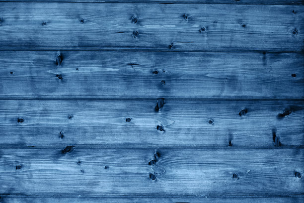 2020年的颜色。木质纹理背景，色调经典的蓝色照片。图片下载