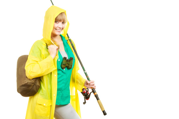 女人拿着钓竿，纺纱设备图片下载