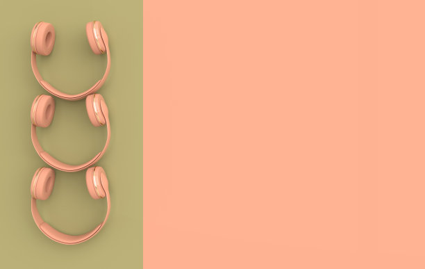 耳机逼真的3d渲染。音乐爱好者简约的背景与粉色和金色的无线音频耳机图片下载