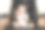 小女孩坐在办公椅上玩邮票图片下载