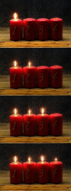 1出现。蜡烛在湿玻璃后面排成一排。图片下载