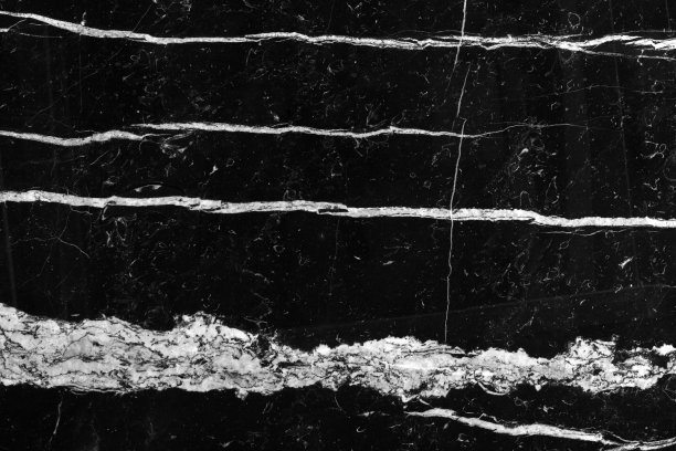 天然黑色花岗岩银色纹理背景分辨率高。黑色的大理石。图片下载