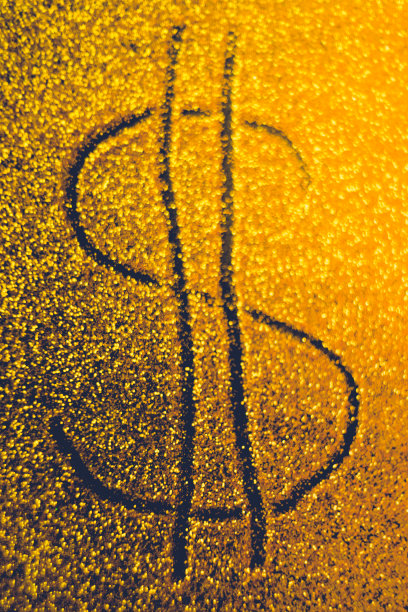 金底色上的美元符号，金条。图片下载