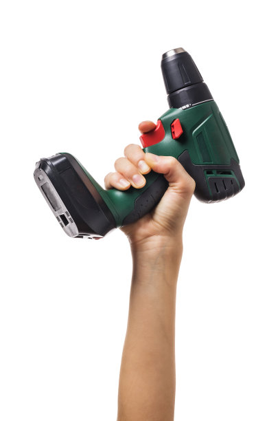 女性举起一只手，拿着一个钻起子，孤立在白色背景上图片下载