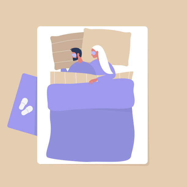 俯视图，一个年轻的成年夫妇在卧室的毯子下拥抱，现代的室内和生活方式图片下载