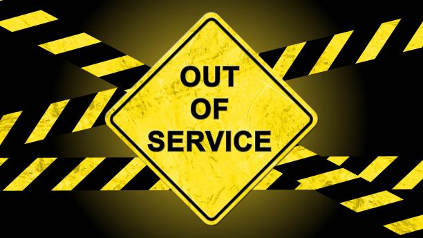 警告标志上用黑黄色的警告带刻有“停止服务”字样图片下载