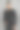 肌肉强壮美丽的脱衣男模特在黑色休闲装上灰色孤立的字体背景图片下载